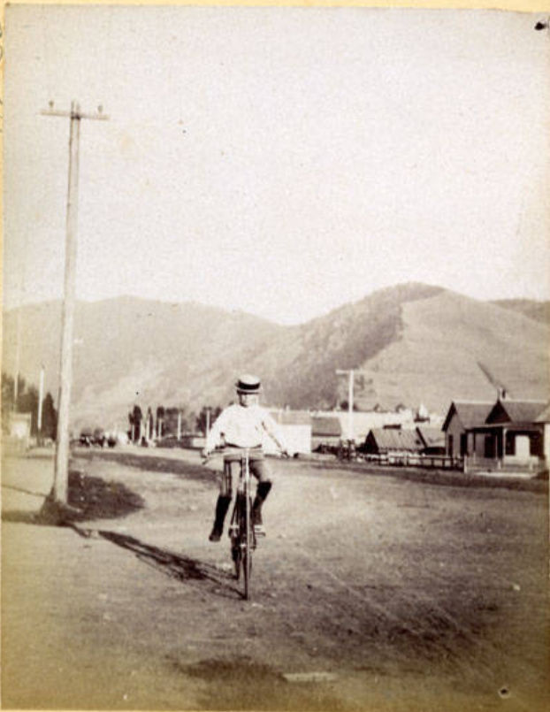 Carl H. on bicycle, Missoula, Montana